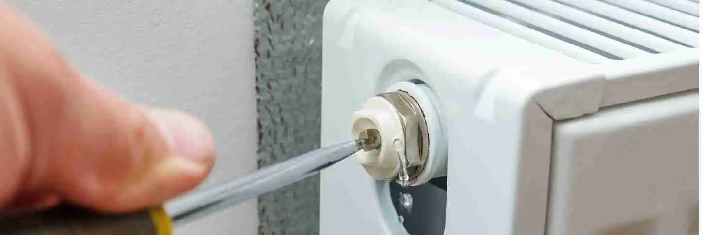 Bleeding a radiator Cold radiator spots - solution - bleeding the radiator